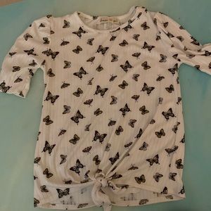 Love this white shirt with butterflies on it